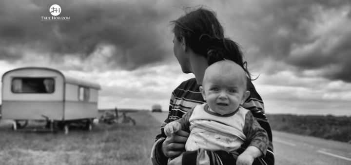 Parent Shields Child From Gathering Storm