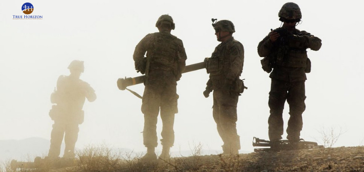 Soldiers On A Hill In Afghanistan