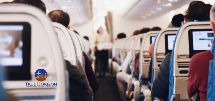 Passengers in an airplane cabin